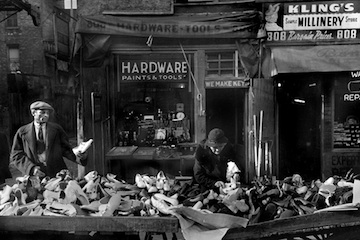 People shopping for shoes on a Maxwell Street market in 1941.